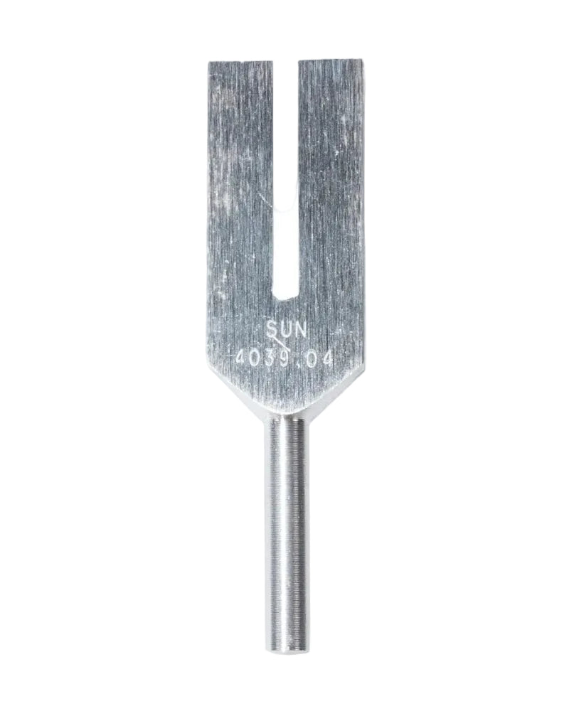 Metal tuning fork with 'SUN' branding on a white background