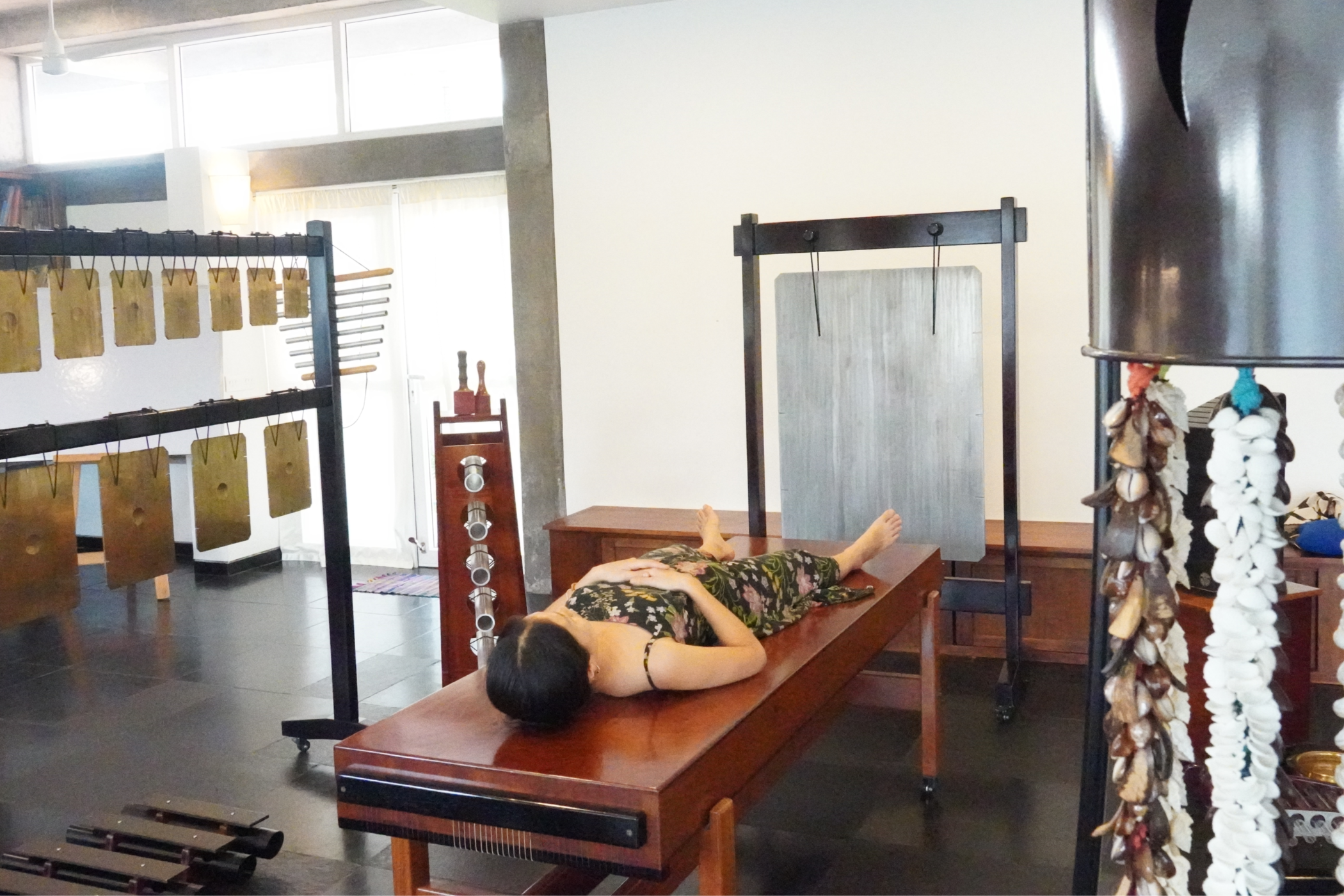 Sonorium sound healing treatment room featuring Svaram handcrafted resonating instruments from Auroville