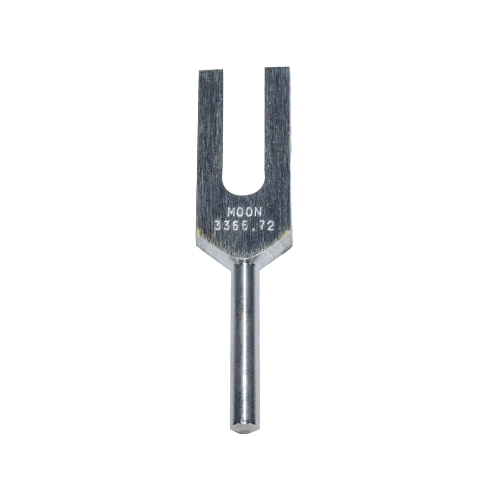 Metal tuning fork with 'MOON'