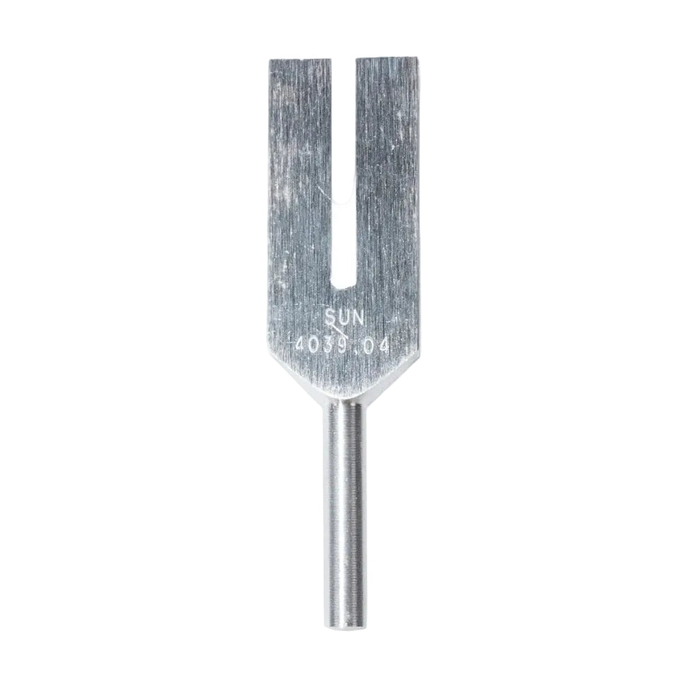 Metal tuning fork with 'SUN' branding on a white background